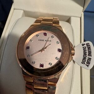 Anne Klein Rose Gold Watch with Ruby Accents